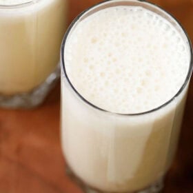 Two glasses of creamy banana milk.