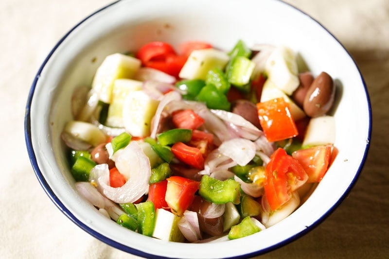 Colorful mixed Greek salad bowl.