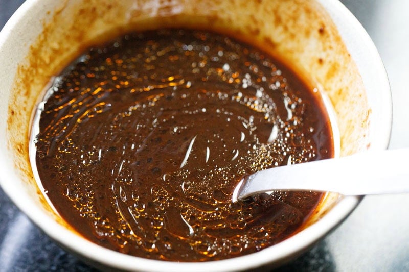 Prepared sauce mix in a bowl to make udon noodles recipe.