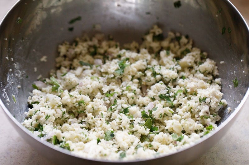 Bowl of crumbled paneer mixture in bowl.