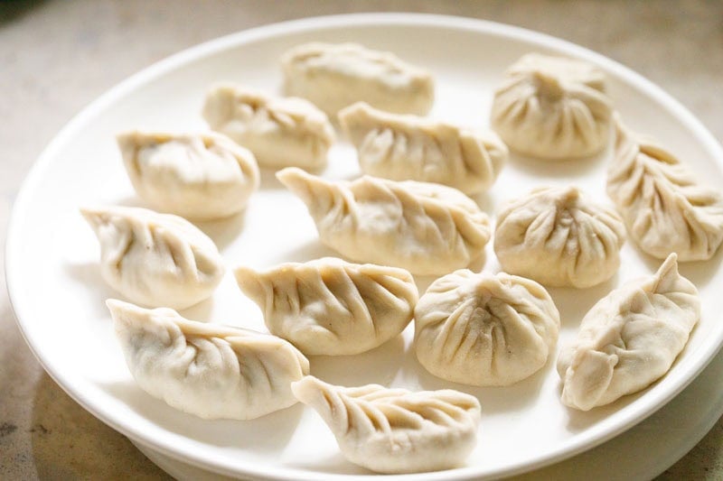 Plate of assorted dumplings or paneer momos.