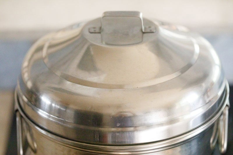 Metal steamer with lid on.