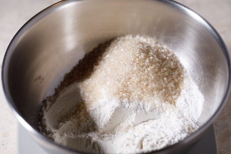 Flours and sugar in a mixing bowl.