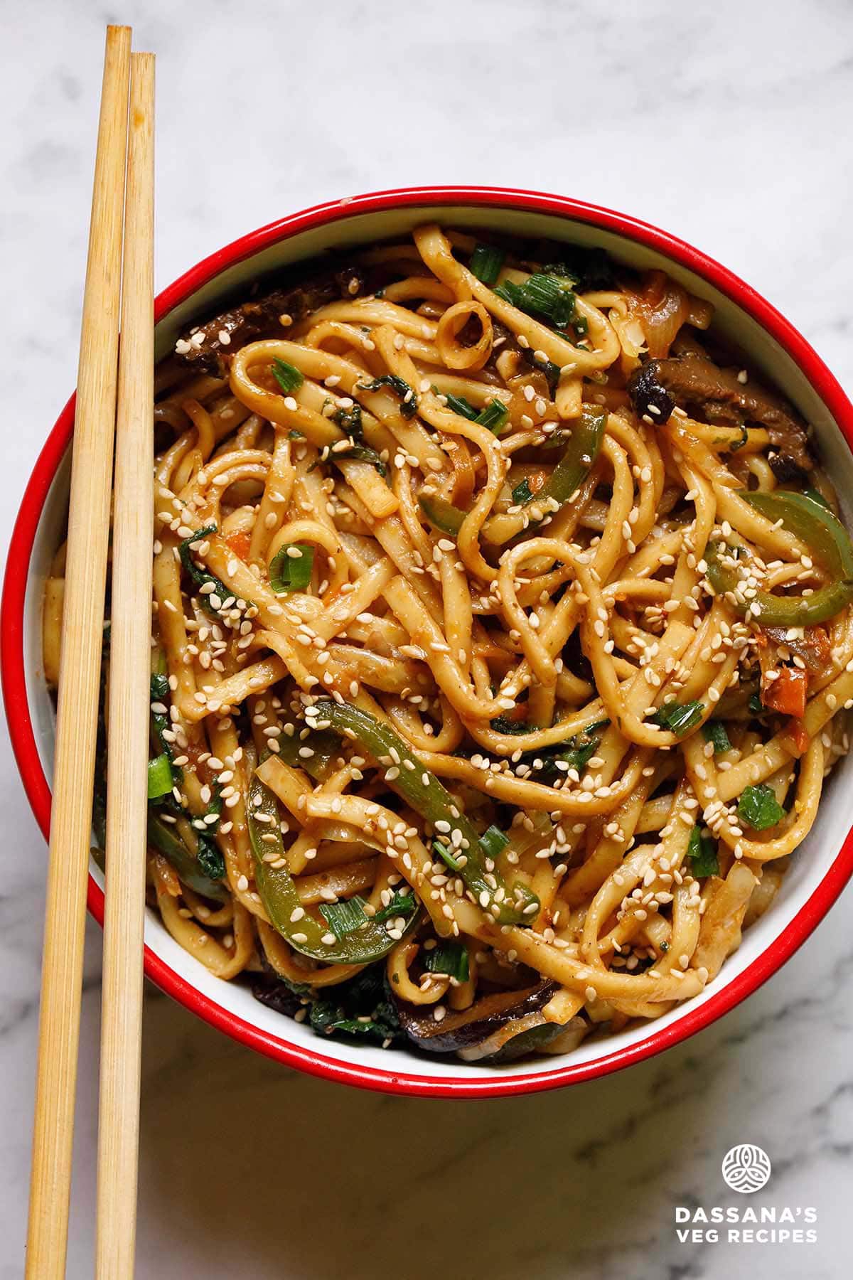 Bowl of stir-fried udon noodles.