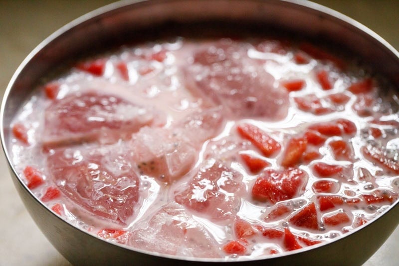 ice cubes in mohabbat ka sharbat drink in bowl.