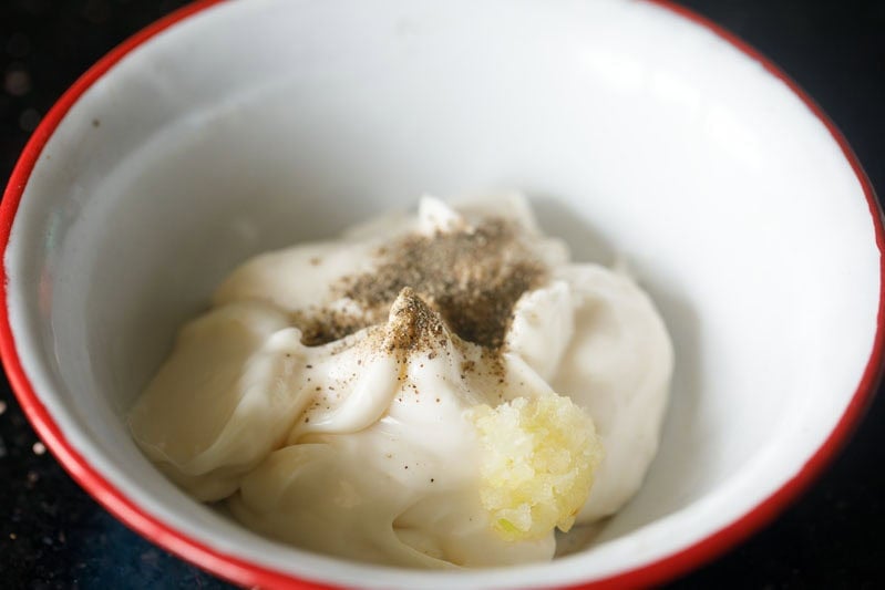 mayonnaise and seasonings in bowl.