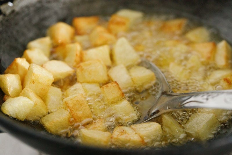 crispy golden potatoes in oil.