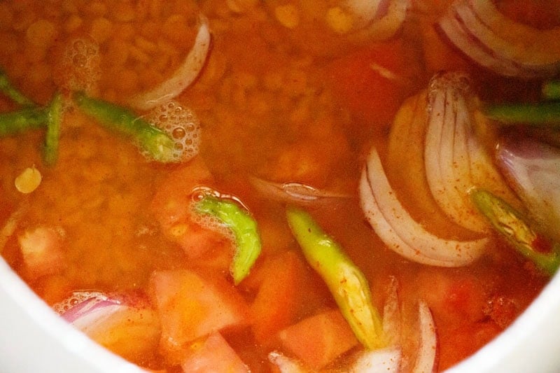 Water added to cooker.