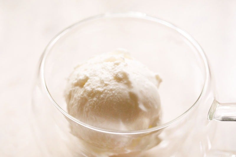vanilla ice cream in a glass cup.
