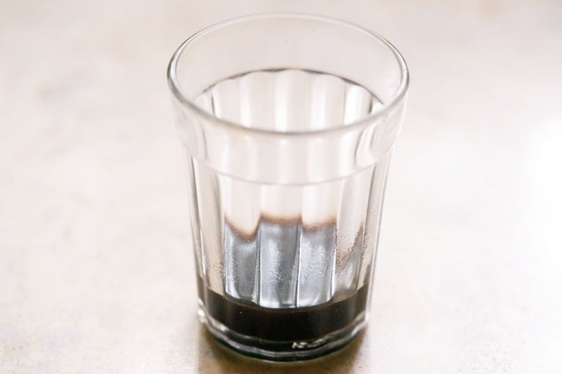 espresso shot in a small glass.