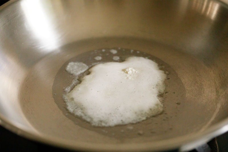 Melted butter in a frying pan.