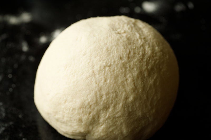 Well kneaded deep dish pizza crust dough.