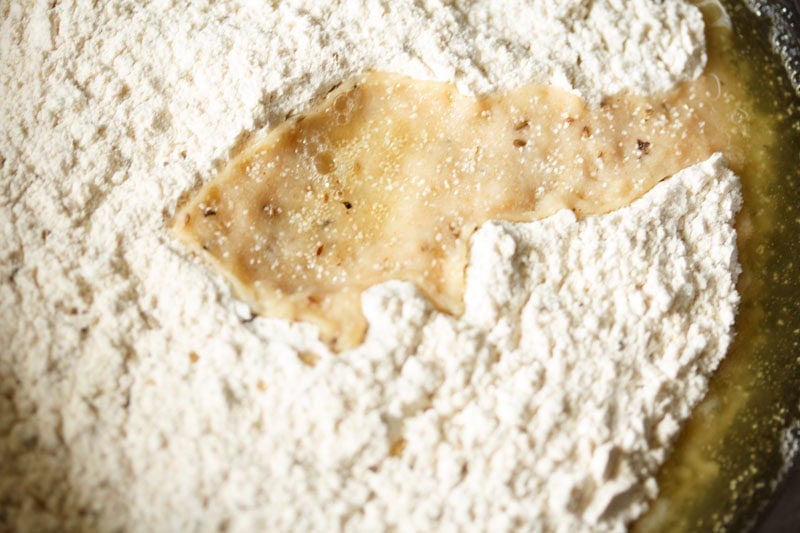 Hot melted ghee layer on the flours.