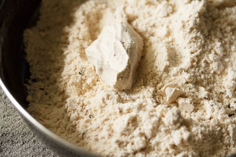 Portion of pressed flour mixture on top of the dry flours mix.