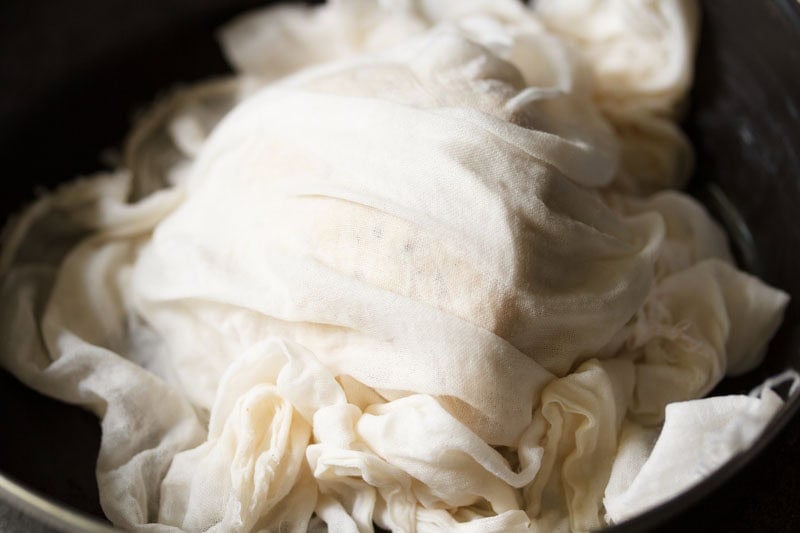 Dough covered with a wet muslin to let it rest.