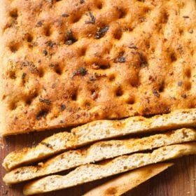 Whole wheat focaccia bread slices.