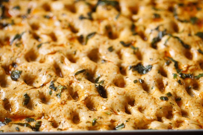 Golden, herb-topped focaccia bread.