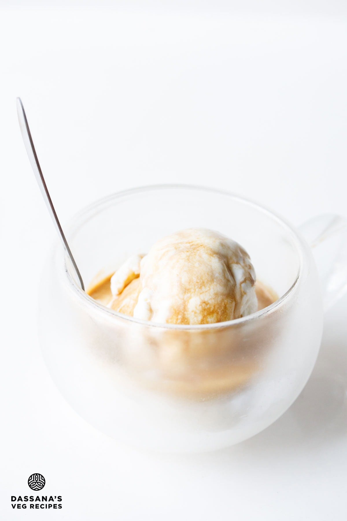 Italian affogato dessert in glass cup with spoon