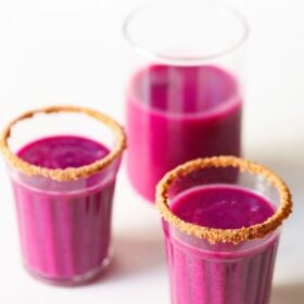 Jamun shots and jamun juice in glasses with text layovers.