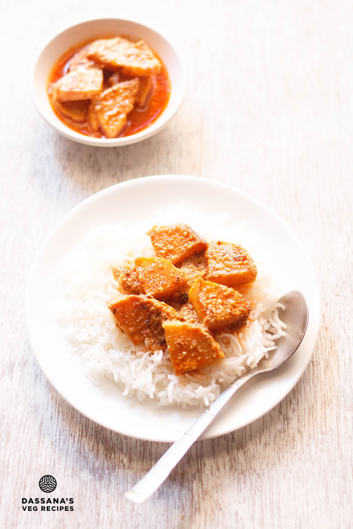 knol khol or kohlrabi curry over steamed rice in a plate.