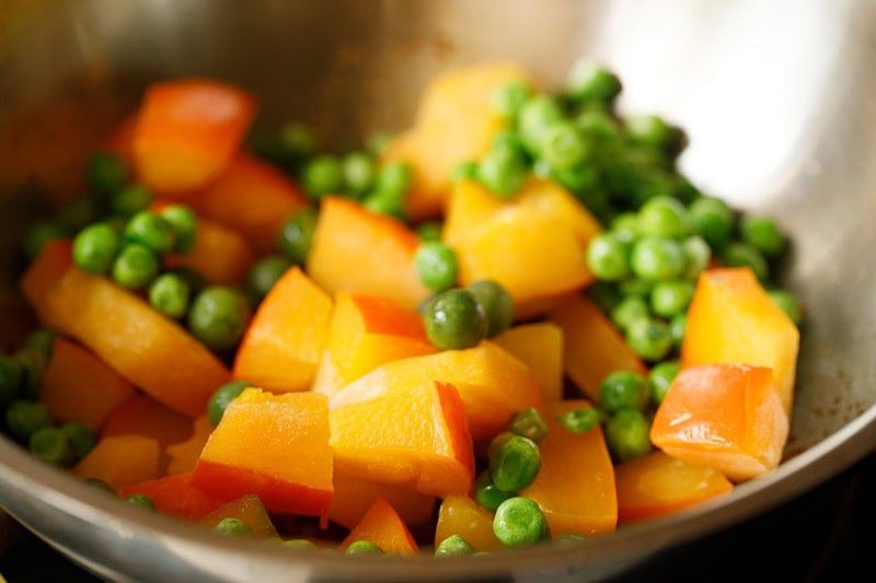 Chopped pumpkin, pea eggplants and green peas mixture.