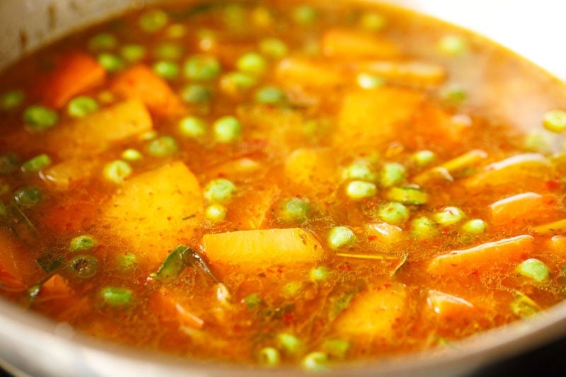Water added in pan and mixed with pumpkin and other ingredients.