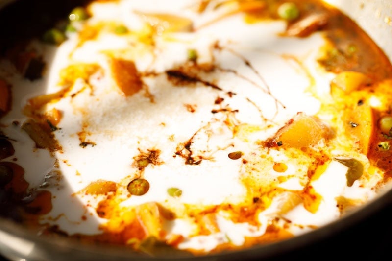Creamy coconut milk and soy sauce added to the pumpkin curry.