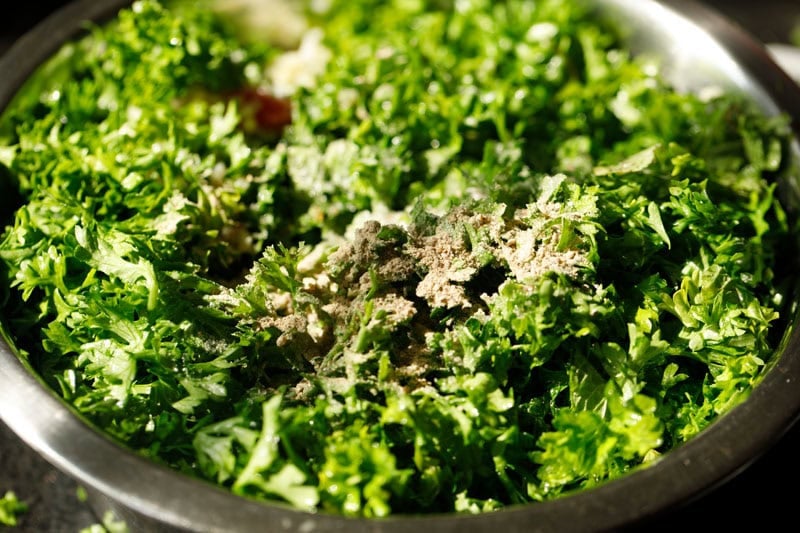 Salt and pepper on parsley.