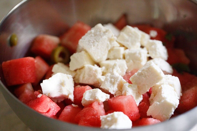 Watermelon and feta cheese in bowl.