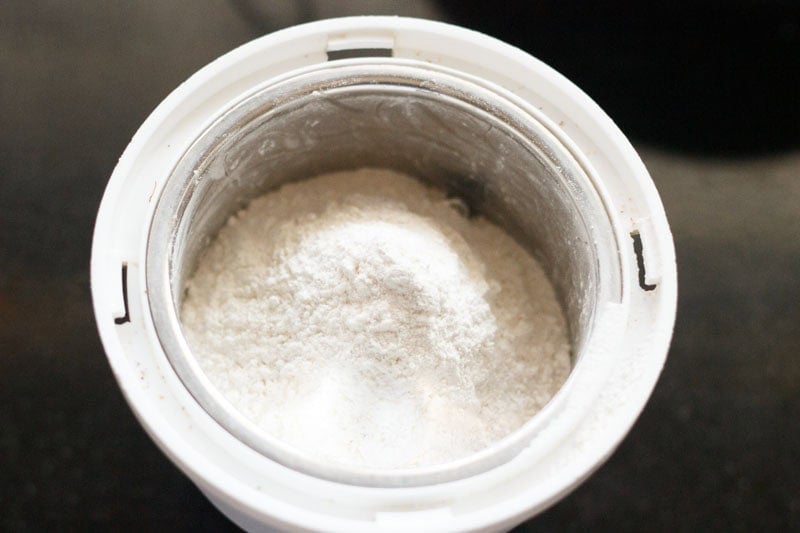 White powdered sugar in grinder.