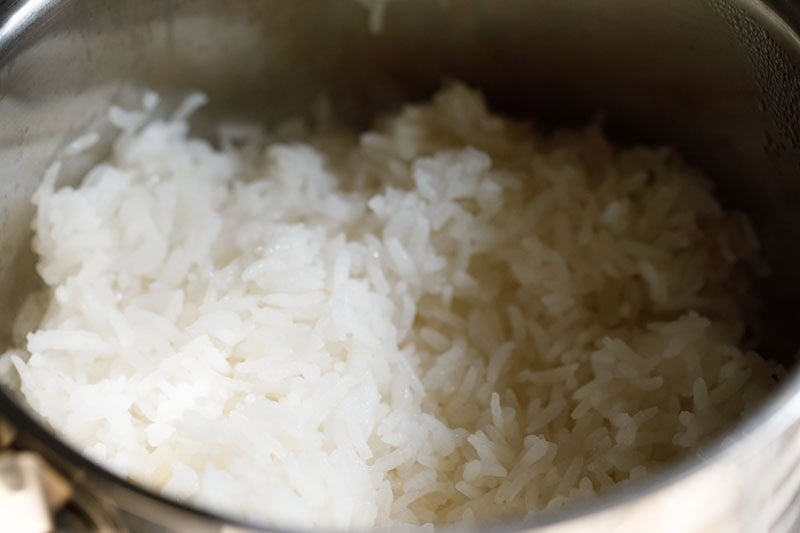 Perfectly cooked jasmine rice in pan.