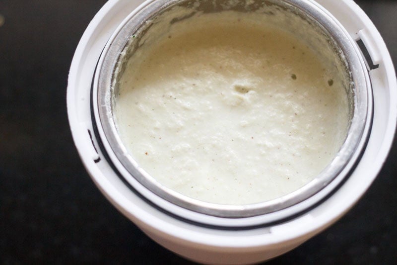 Finely ground chutney ingredients in grinder.