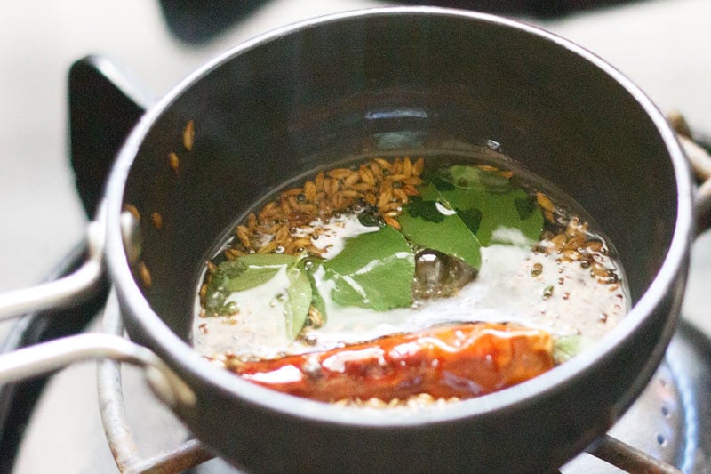 Tempered ingredients for dosa chutney in pan.