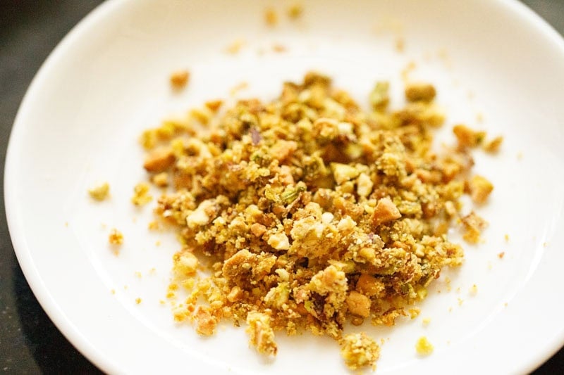 Crushed pistachios in a plate.