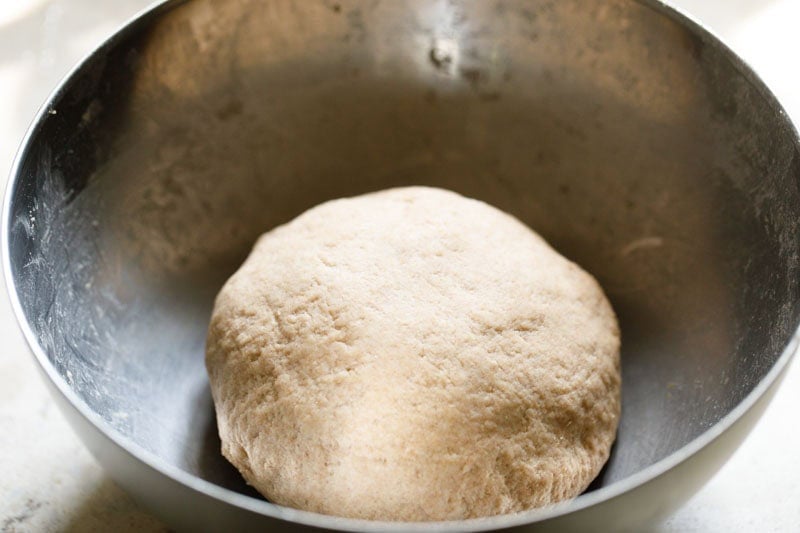 Bowl containing dough.