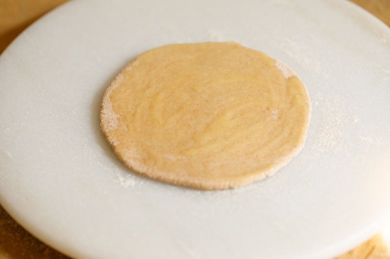 Round dough on a flat surface
