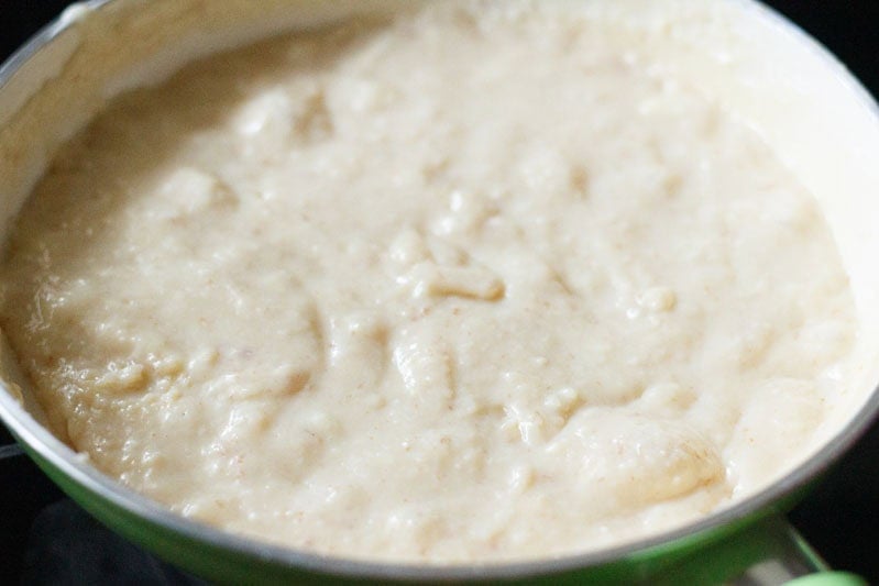 Simmering paneer burfi mixture.