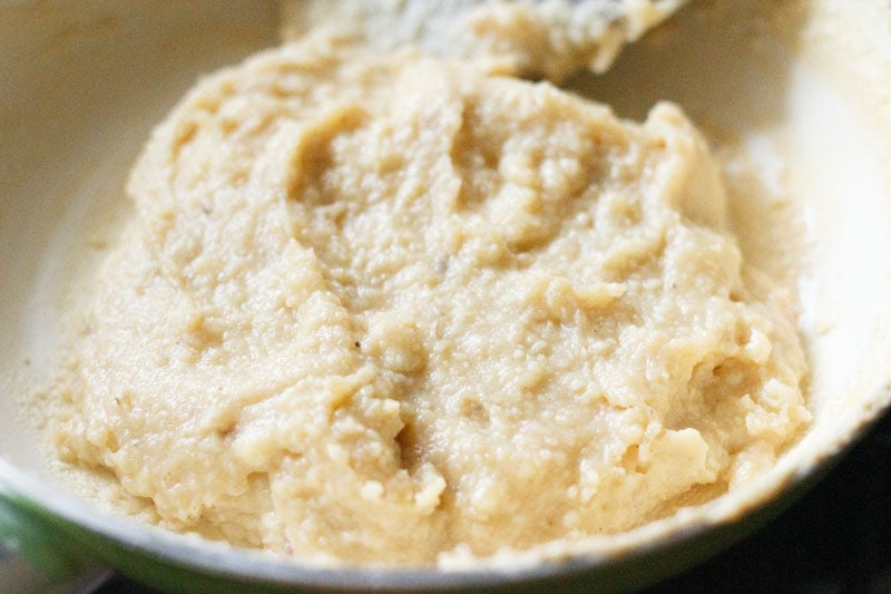 Malai burfi mixture in pan.