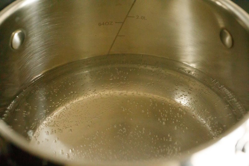 Water simmering in a pot.