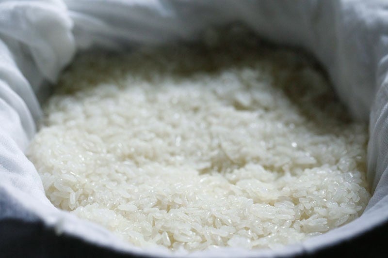Cooked Thai sticky rice or glutinous rice on muslin.
