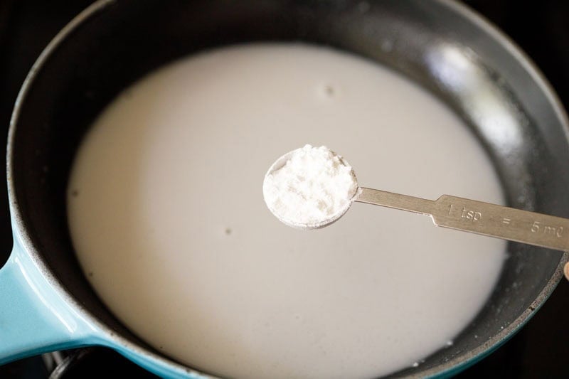Cornstarch in a spoon.