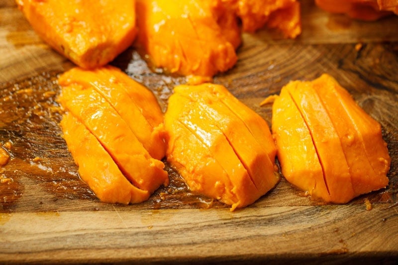 Peeled and sliced alphonso mangoes.