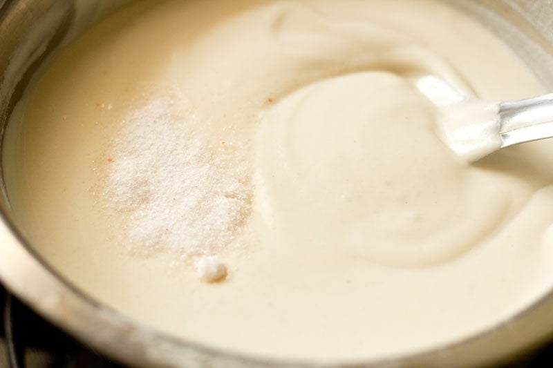 Salt sprinkled on fermented rice dosa batter.