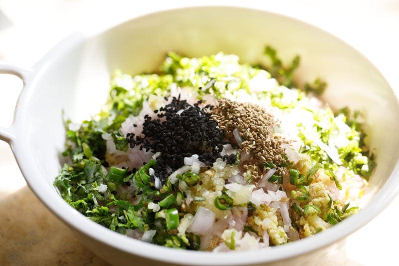 Bowl of mixed herbs and spices.