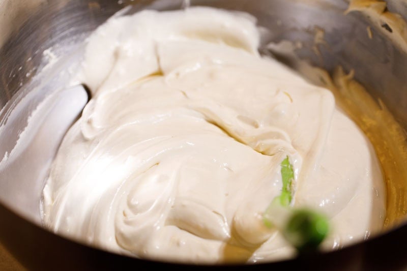 Whipped cream folded with cream cheese.