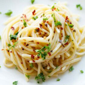 Spaghetti aglio olio with garlic and herbs.