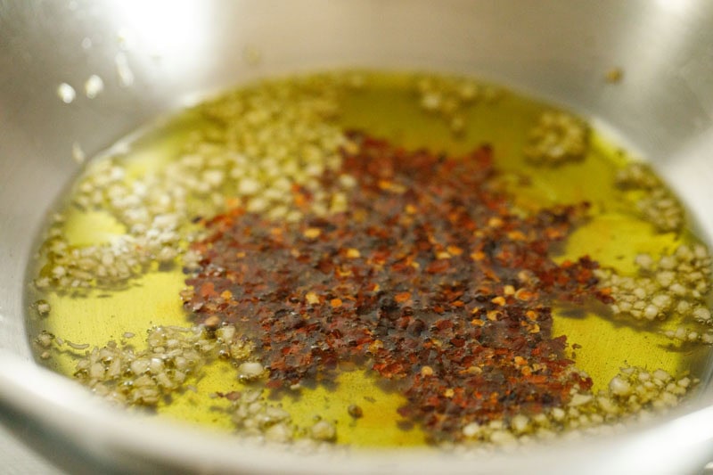 Olive oil with garlic and red pepper flakes.