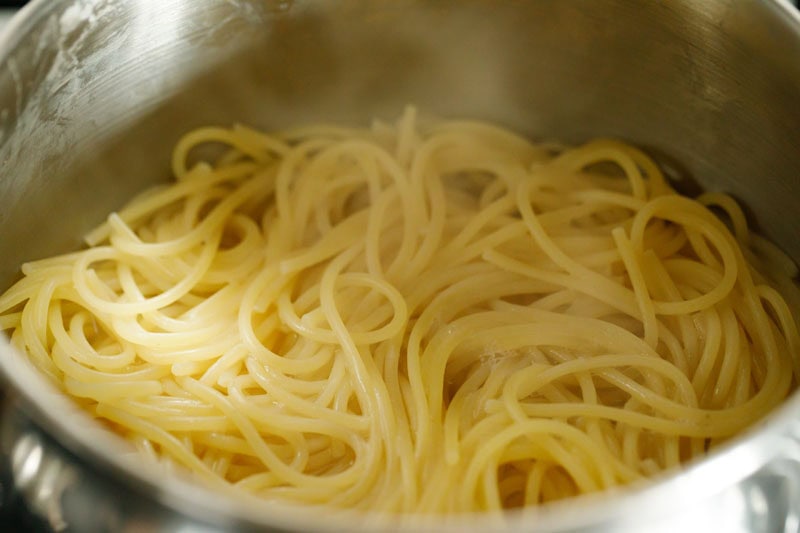 Cooked spaghetti in a pan.