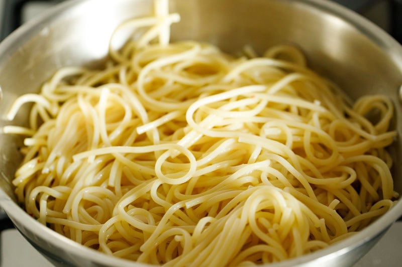 Cooked spaghetti in a pan.