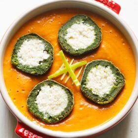 Palak kofta in orange gravy or shaam savera.